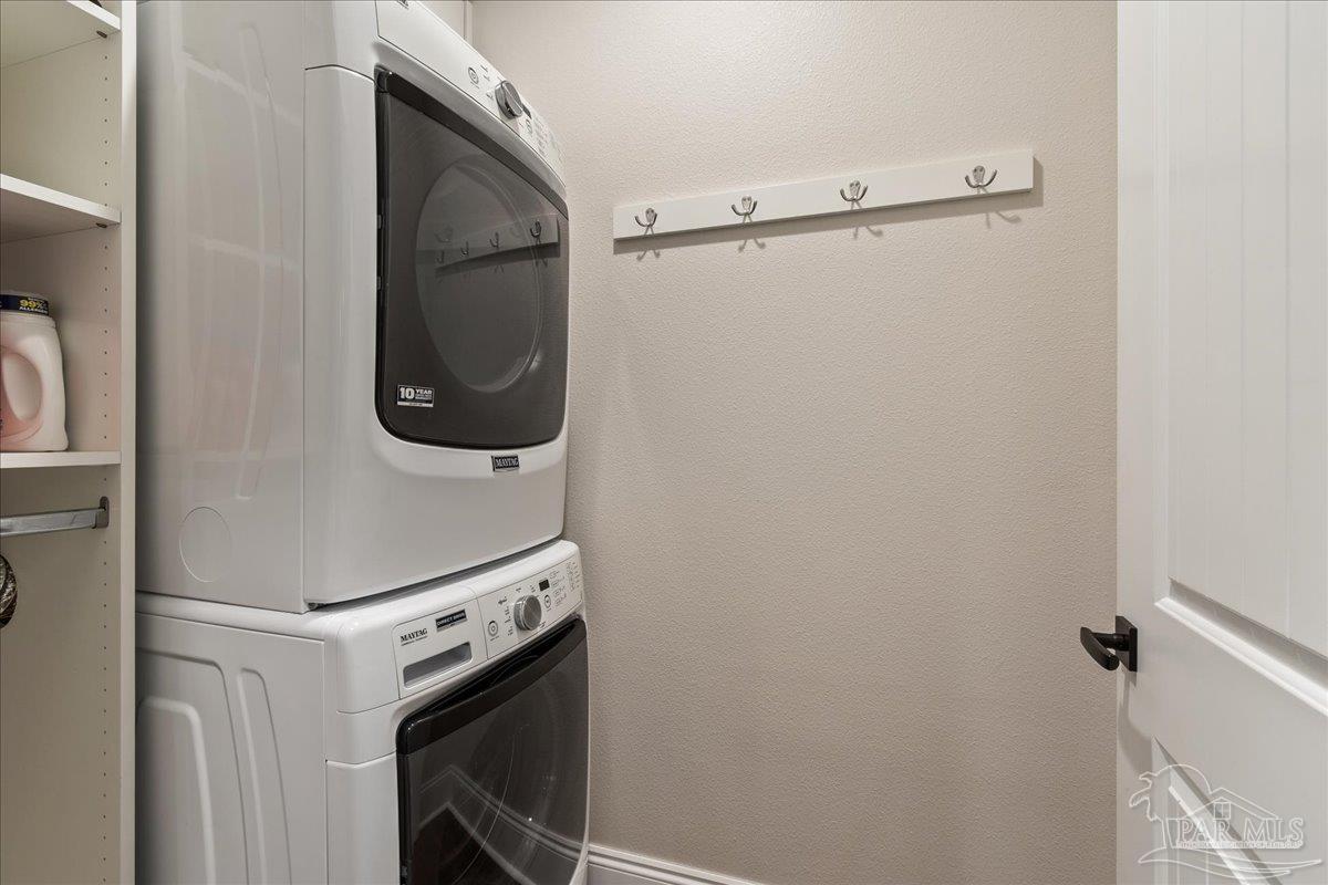 9050 Salter Road Pace, FL 32571 - Photo 47 of 48 a close up view of a washer and dryer