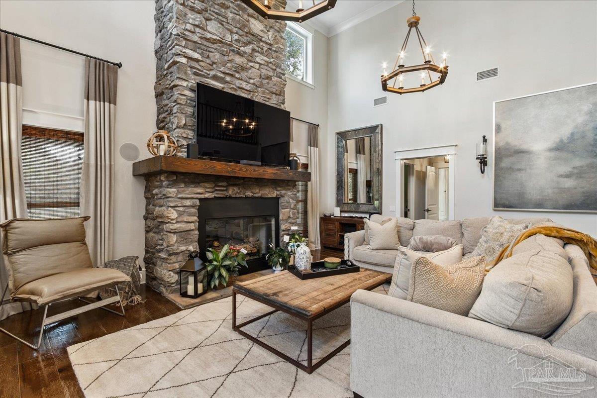 9050 Salter Road Pace, FL 32571 - Photo 5 of 48 a living room with furniture and a fireplace