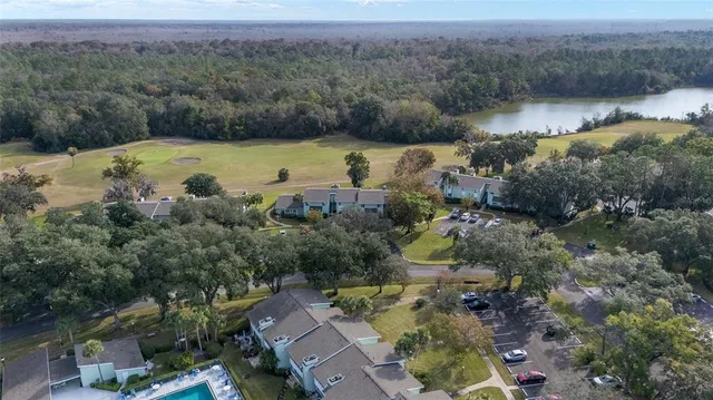 an aerial view of a houses with outdoor space