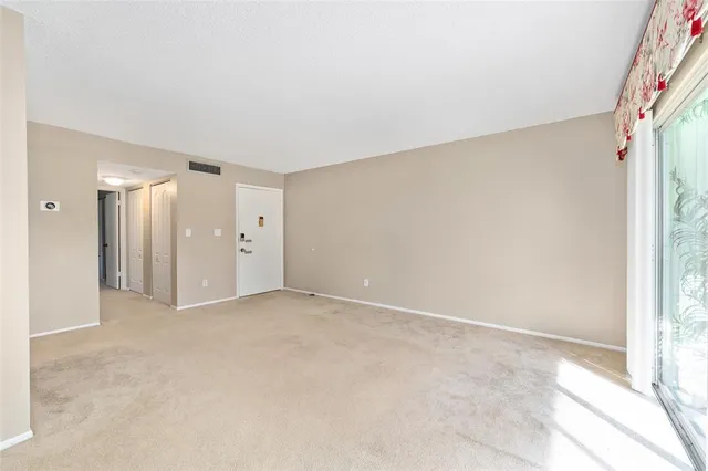 an empty room with a natural light