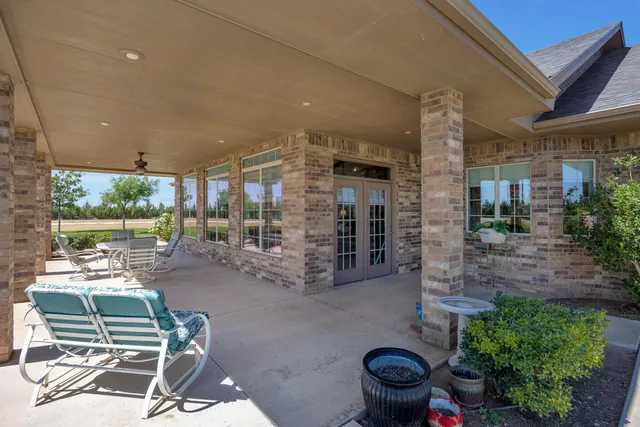 a view of a swimming pool with an outdoor space