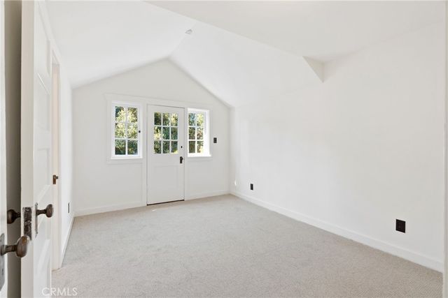 a view of kitchen with wooden floor