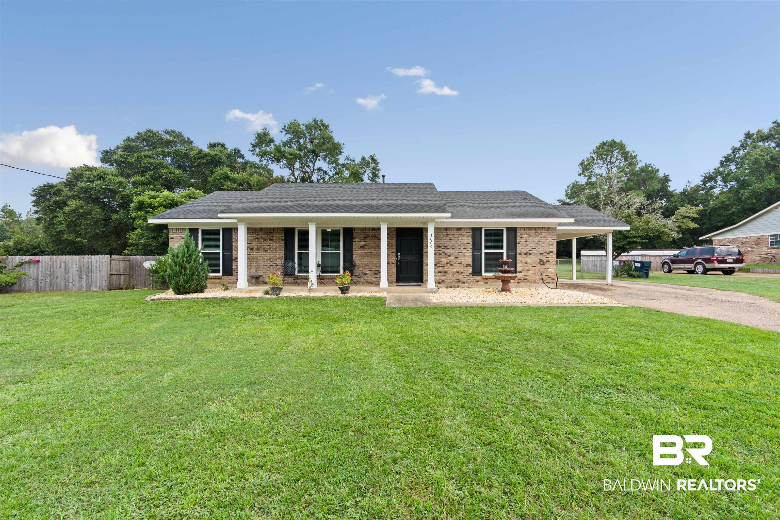 2000 Campfire Drive Semmes, AL 36575 - Photo 1 of 26 Single story home featuring a carport and a front lawn