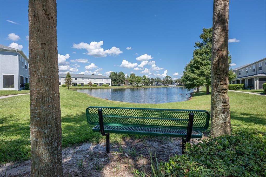 9441 Flowering Cottonwood Road, Unit 41 Orlando, FL 32832 - Photo 13 of 31 a view of a garden with sitting area