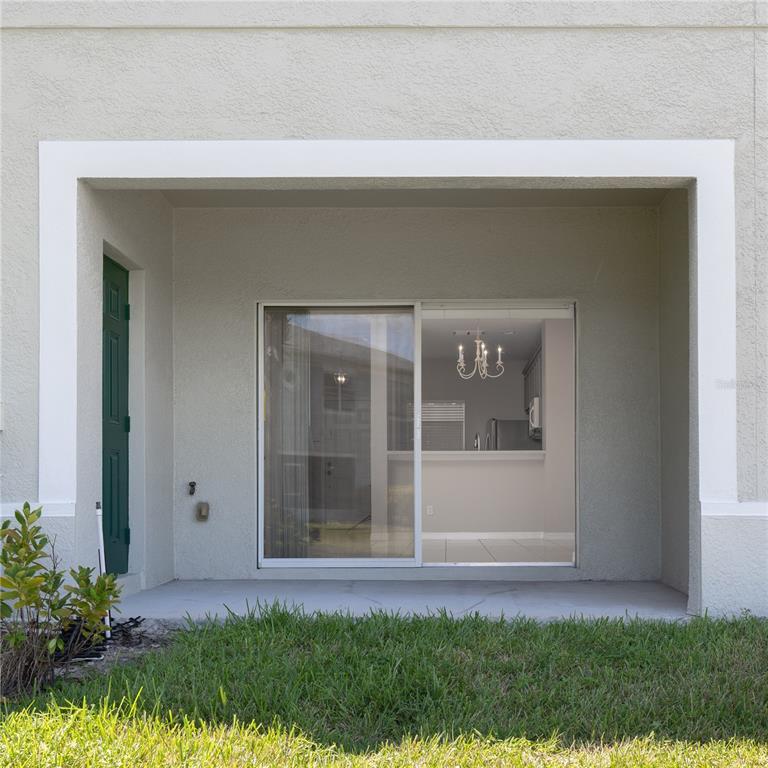 9441 Flowering Cottonwood Road, Unit 41 Orlando, FL 32832 - Photo 14 of 31 a view of front door