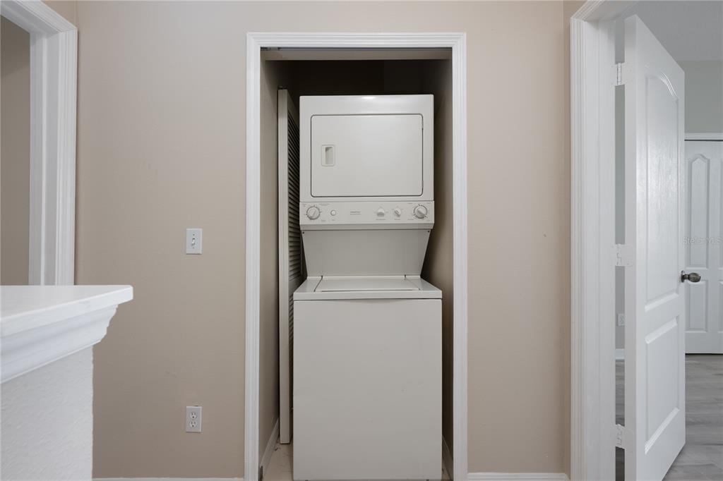 9441 Flowering Cottonwood Road, Unit 41 Orlando, FL 32832 - Photo 18 of 31 a view of washer and dryer
