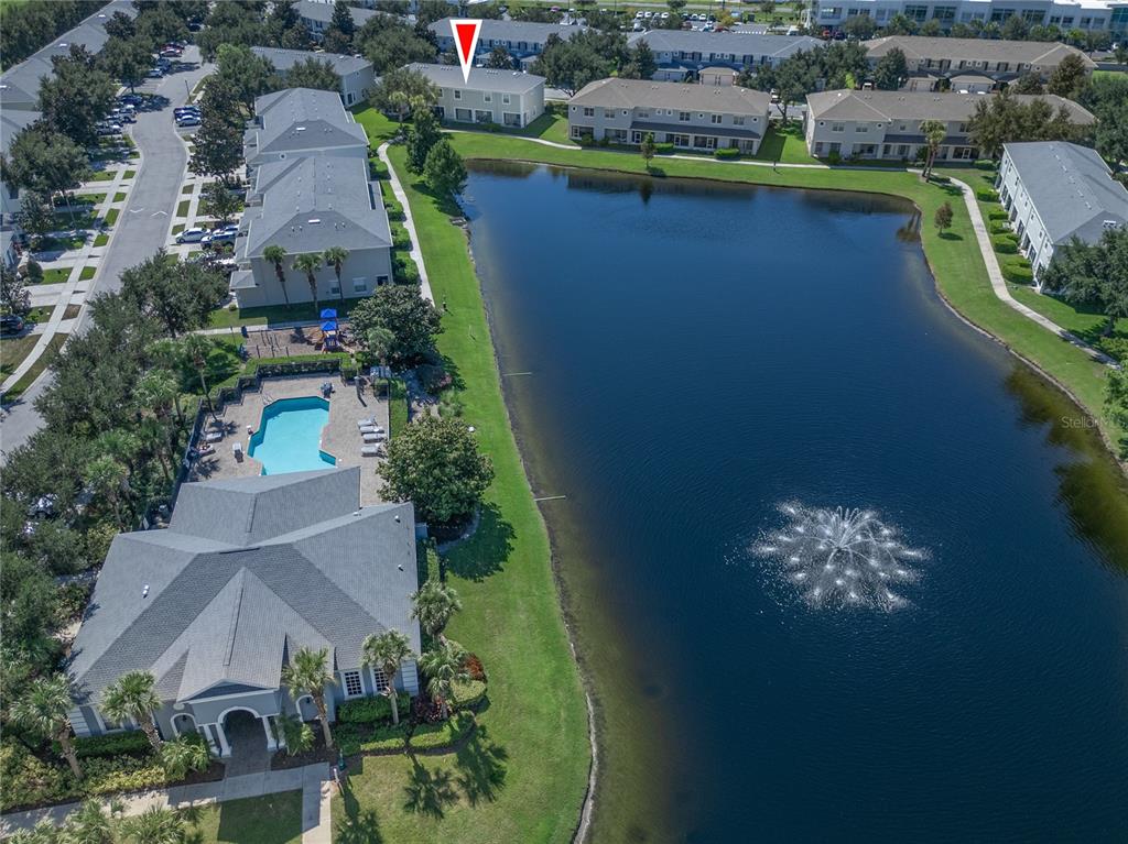 9441 Flowering Cottonwood Road, Unit 41 Orlando, FL 32832 - Photo 25 of 31 an aerial view of a house with a lake view
