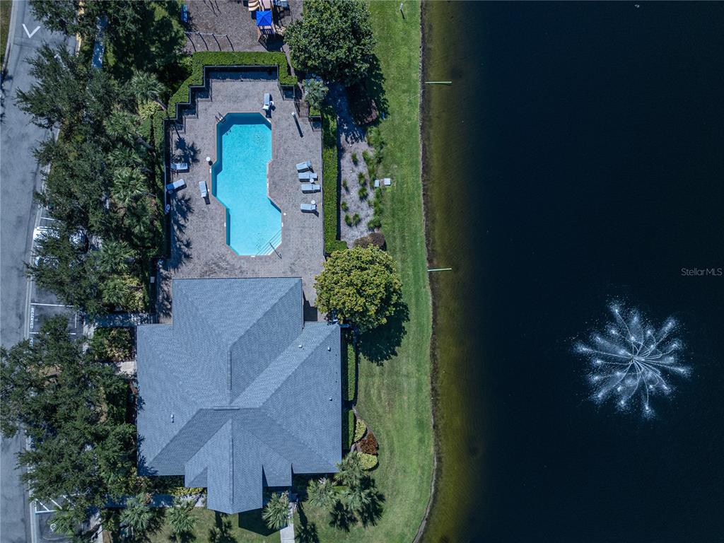 9441 Flowering Cottonwood Road, Unit 41 Orlando, FL 32832 - Photo 26 of 31 an aerial view of a house with a yard