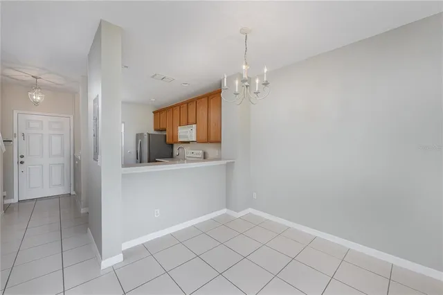 a view of a kitchen and window