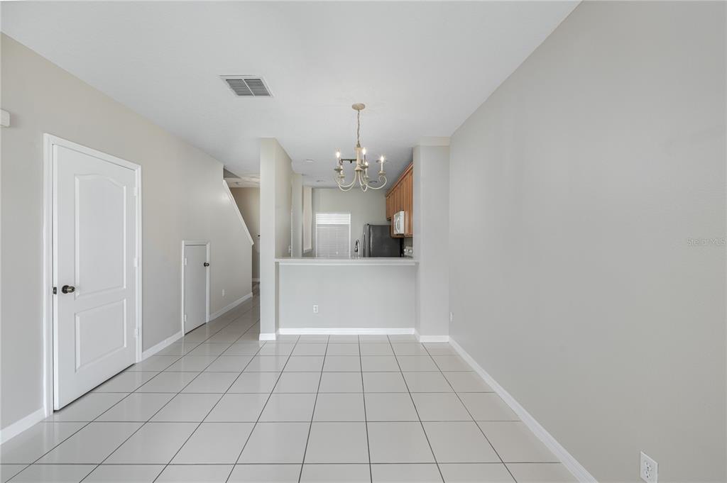 9441 Flowering Cottonwood Road, Unit 41 Orlando, FL 32832 - Photo 10 of 31 a view of a hallway view with staircase