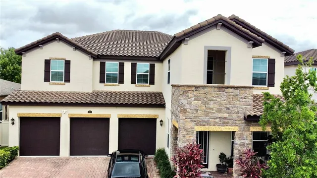 a front view of a house with a garage
