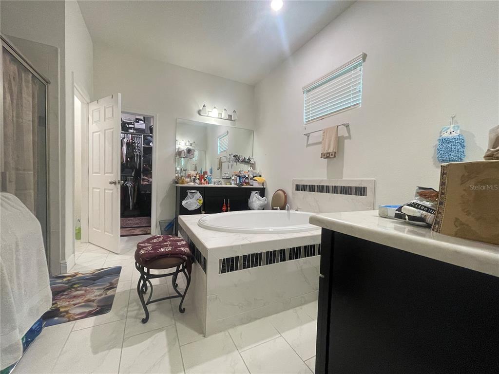 16611 Toccoa Row Winter Garden, FL 34787 - Photo 15 of 31 a kitchen that has a table and a chair in it