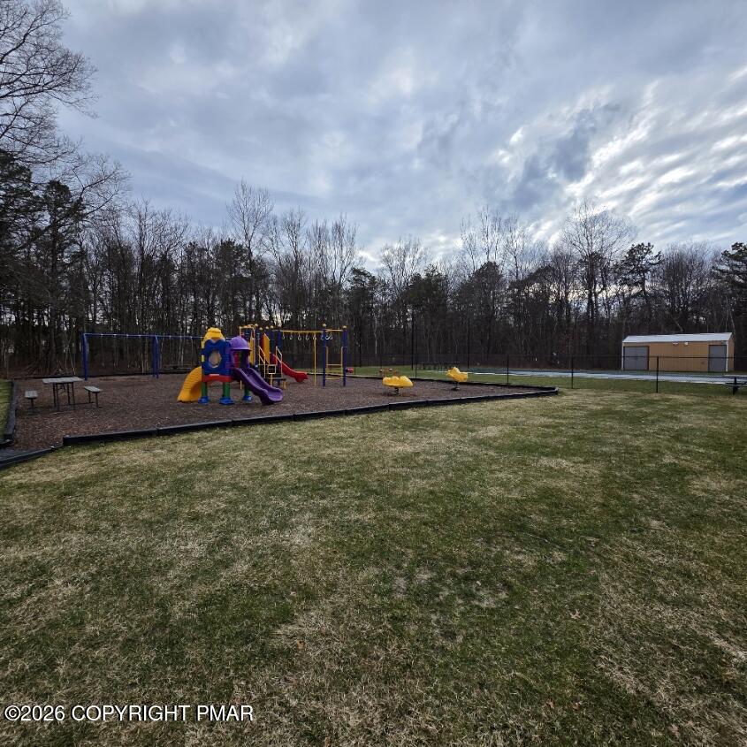 Snowy Ridge Jim Thorpe, PA 18229 - Photo 34 of 40 a view of a park with swings and slides