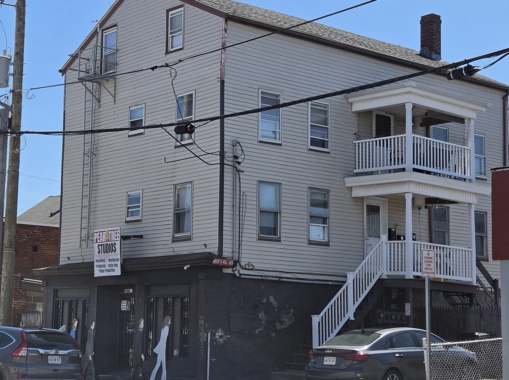 a view of a house with a street