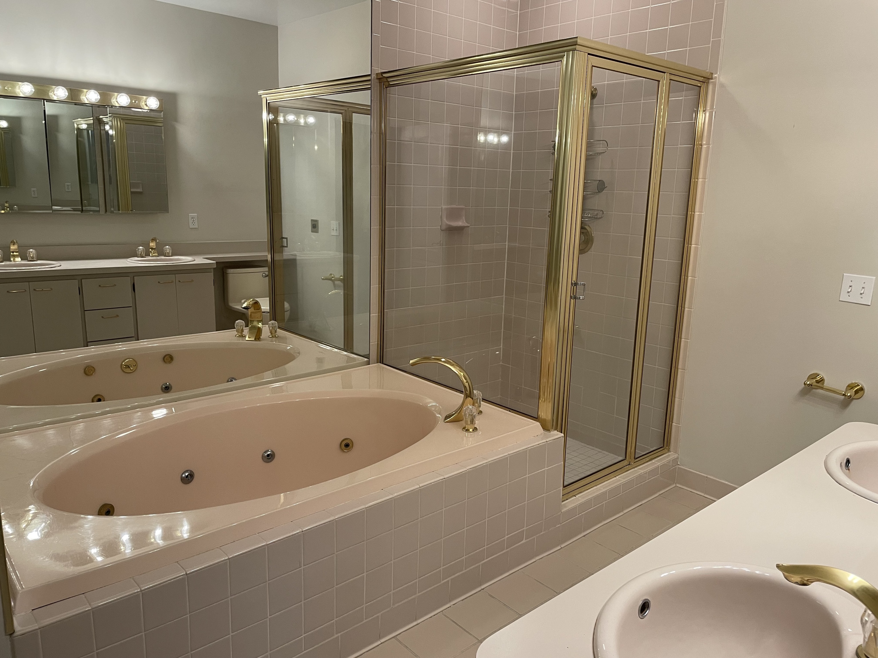 8 Sedgewick Village Lane Darien, CT 06820 - Photo 11 of 15 a bathroom with a tub and a shower