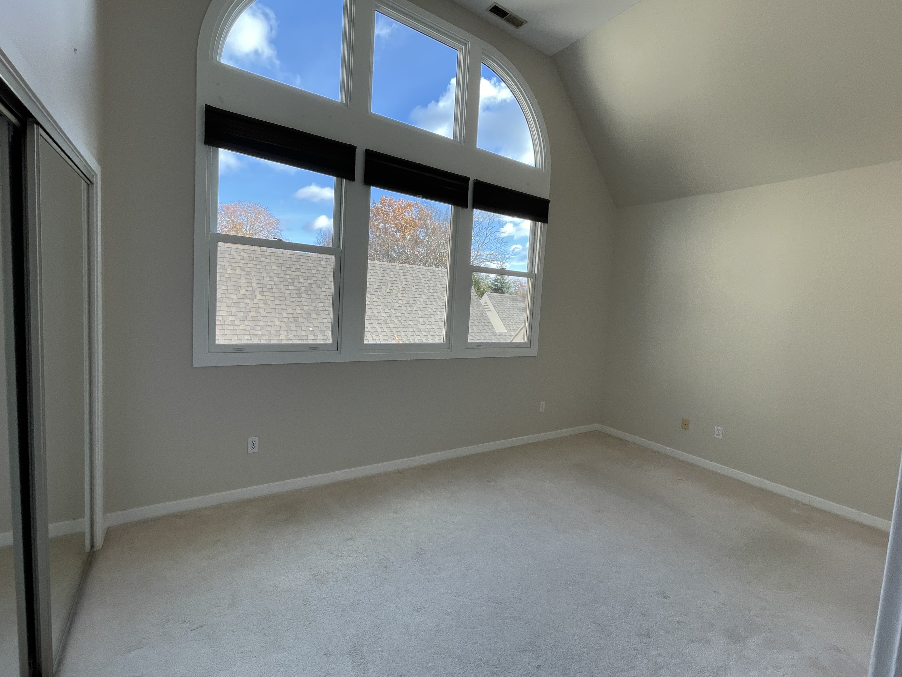 8 Sedgewick Village Lane Darien, CT 06820 - Photo 12 of 15 an empty room with a window