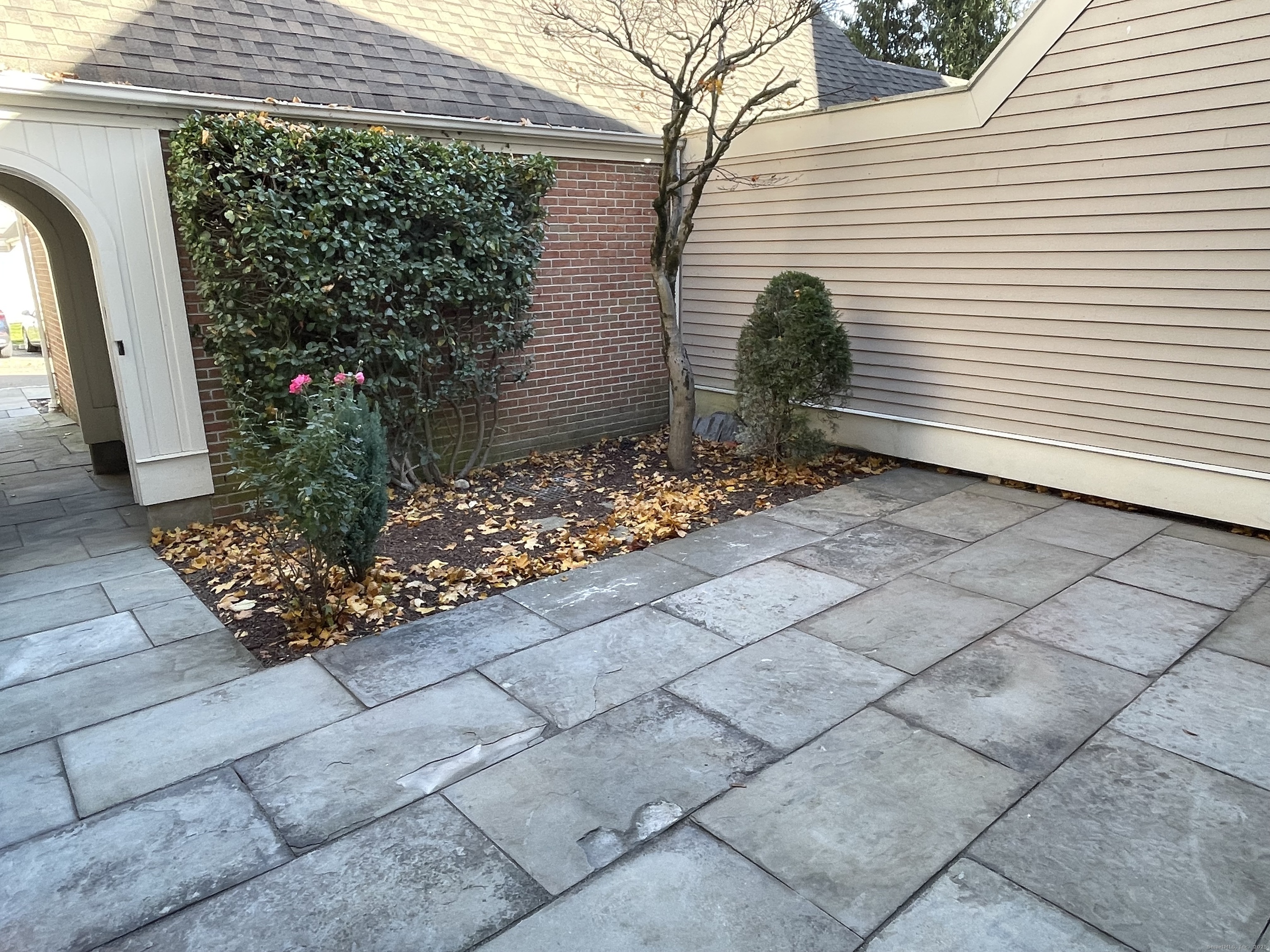 8 Sedgewick Village Lane Darien, CT 06820 - Photo 3 of 15 a view of a backyard