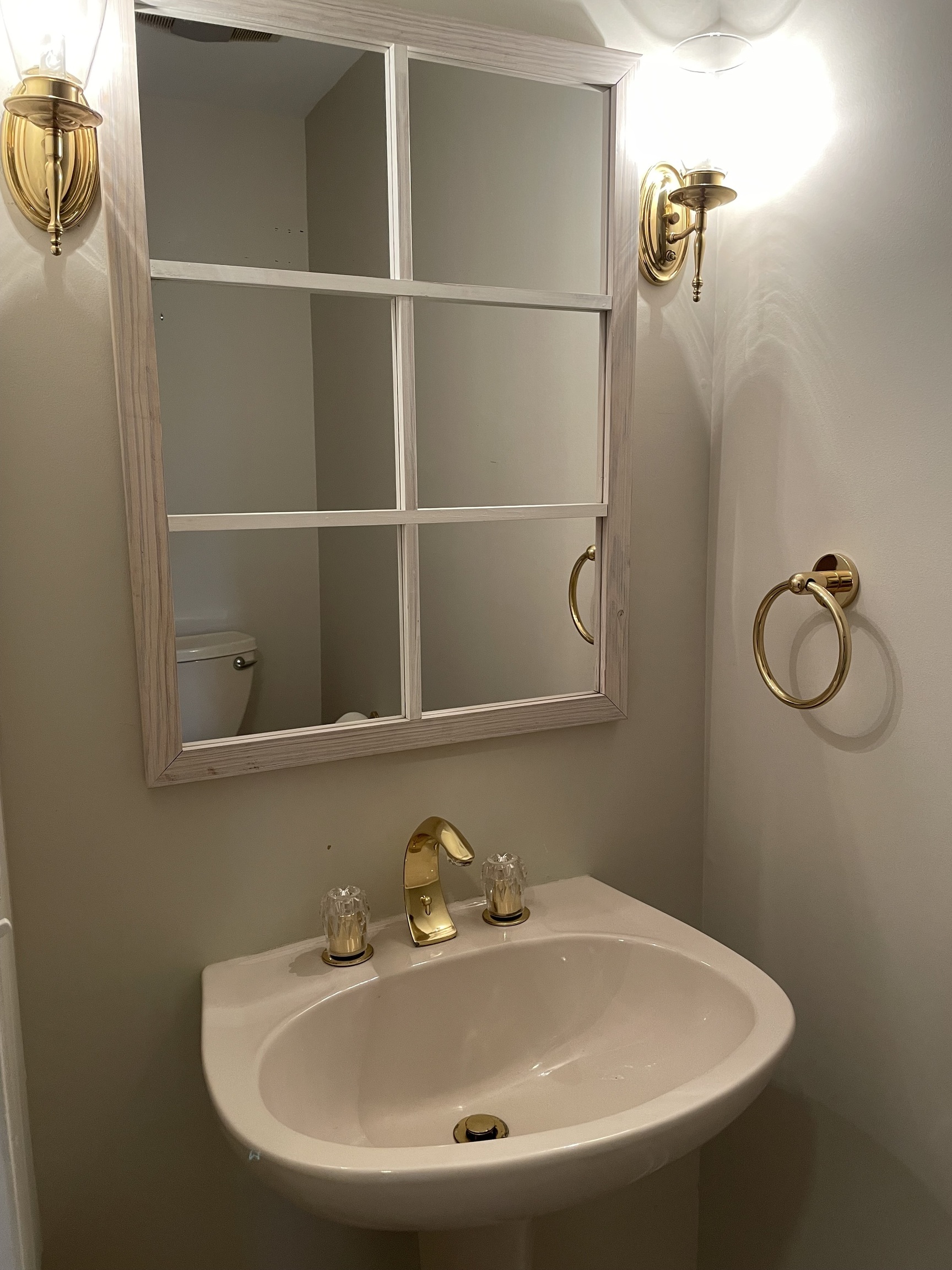 8 Sedgewick Village Lane Darien, CT 06820 - Photo 6 of 15 a bathroom with a sink and mirror