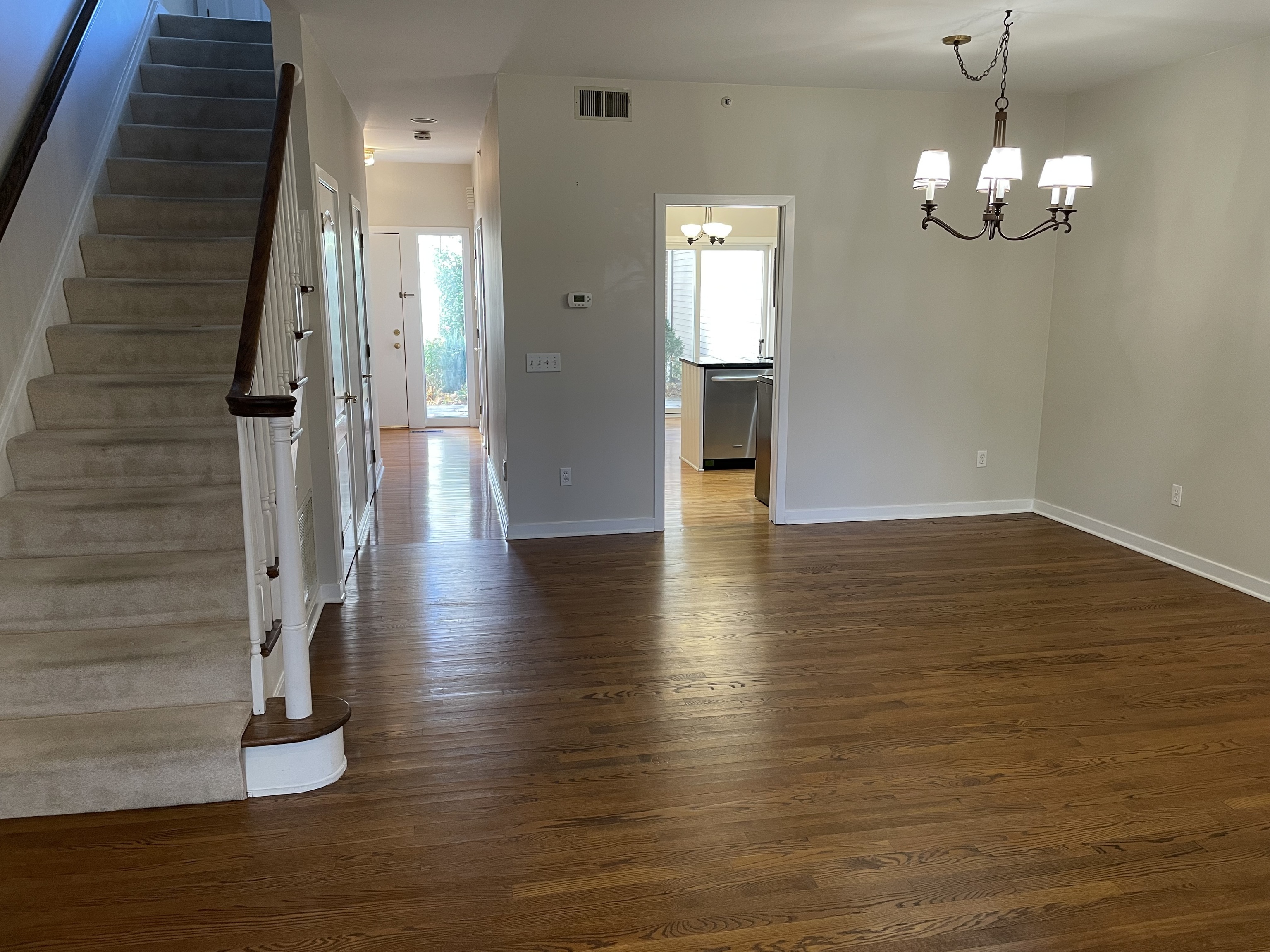 8 Sedgewick Village Lane Darien, CT 06820 - Photo 9 of 15 a view of an entryway with wooden floor