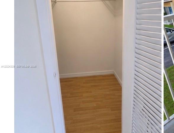 5401 Southwest 77th Court, Unit 202E Miami, FL 33155 - Photo 4 of 6 a bathroom with a shower