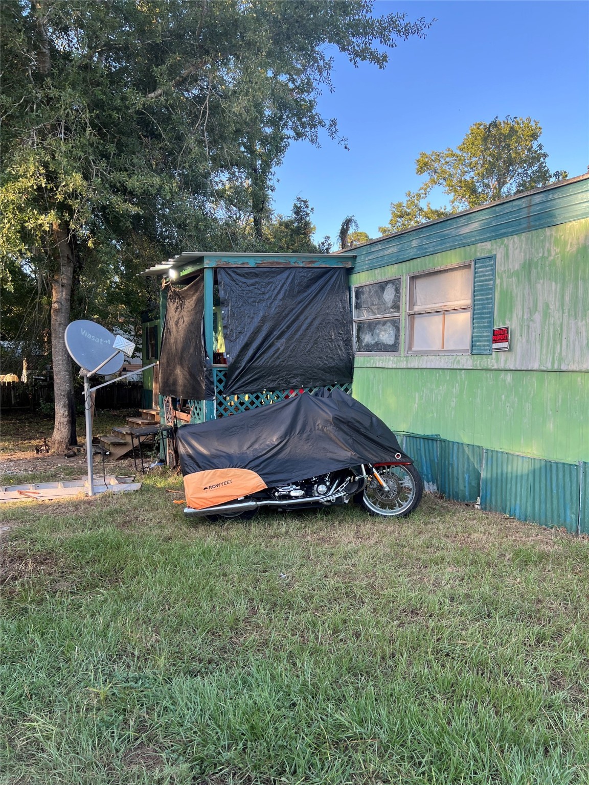 25303 Colette Street Porter, TX 77365 - Photo 4 of 12 a view of a backyard with a garden and plants