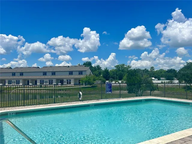 an aerial view of a house with a garden