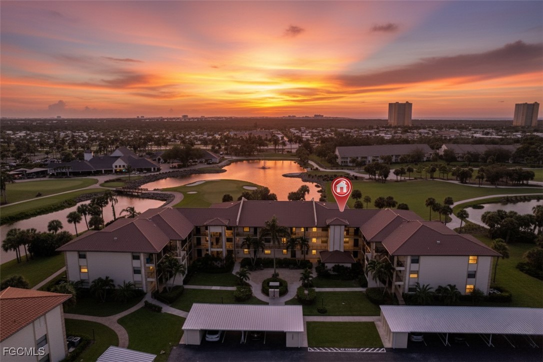 an aerial view of residential houses and city street