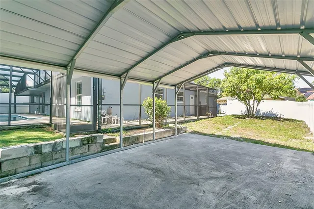 a view of swimming pool with outdoor seating and yard