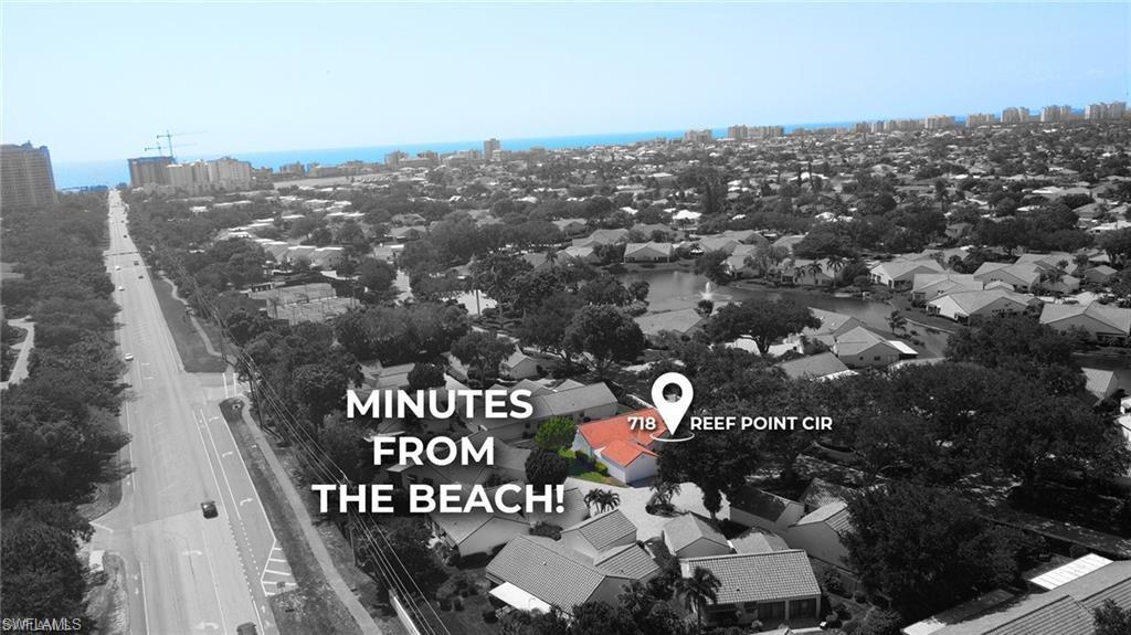 718 Reef Point Circle Naples, FL 34108 - Photo 21 of 23 an aerial view of a city