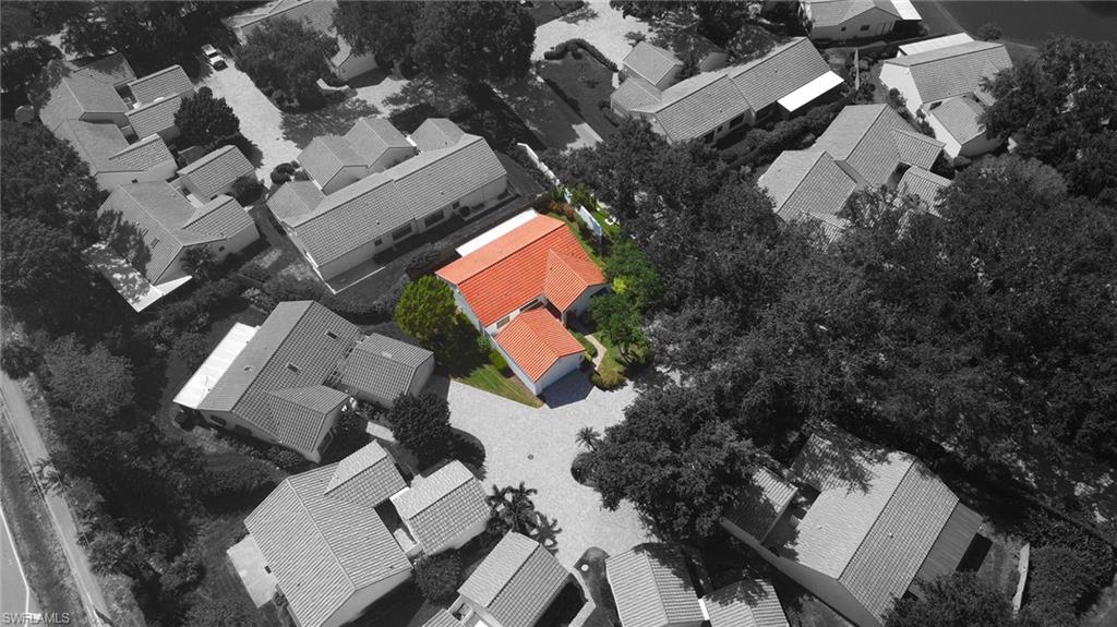 718 Reef Point Circle Naples, FL 34108 - Photo 22 of 23 an aerial view of house with outdoor space