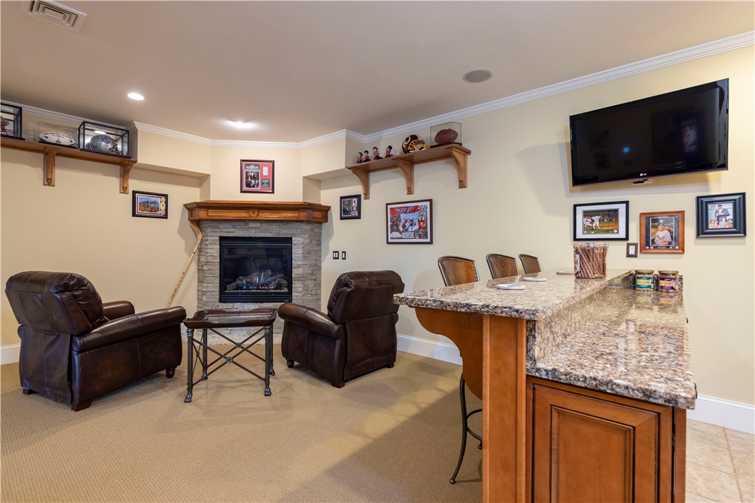 2 Kettle Cl Westerly, RI 02891 - Photo 42 of 49 Lower Level Bar/Lounge with gas fireplace