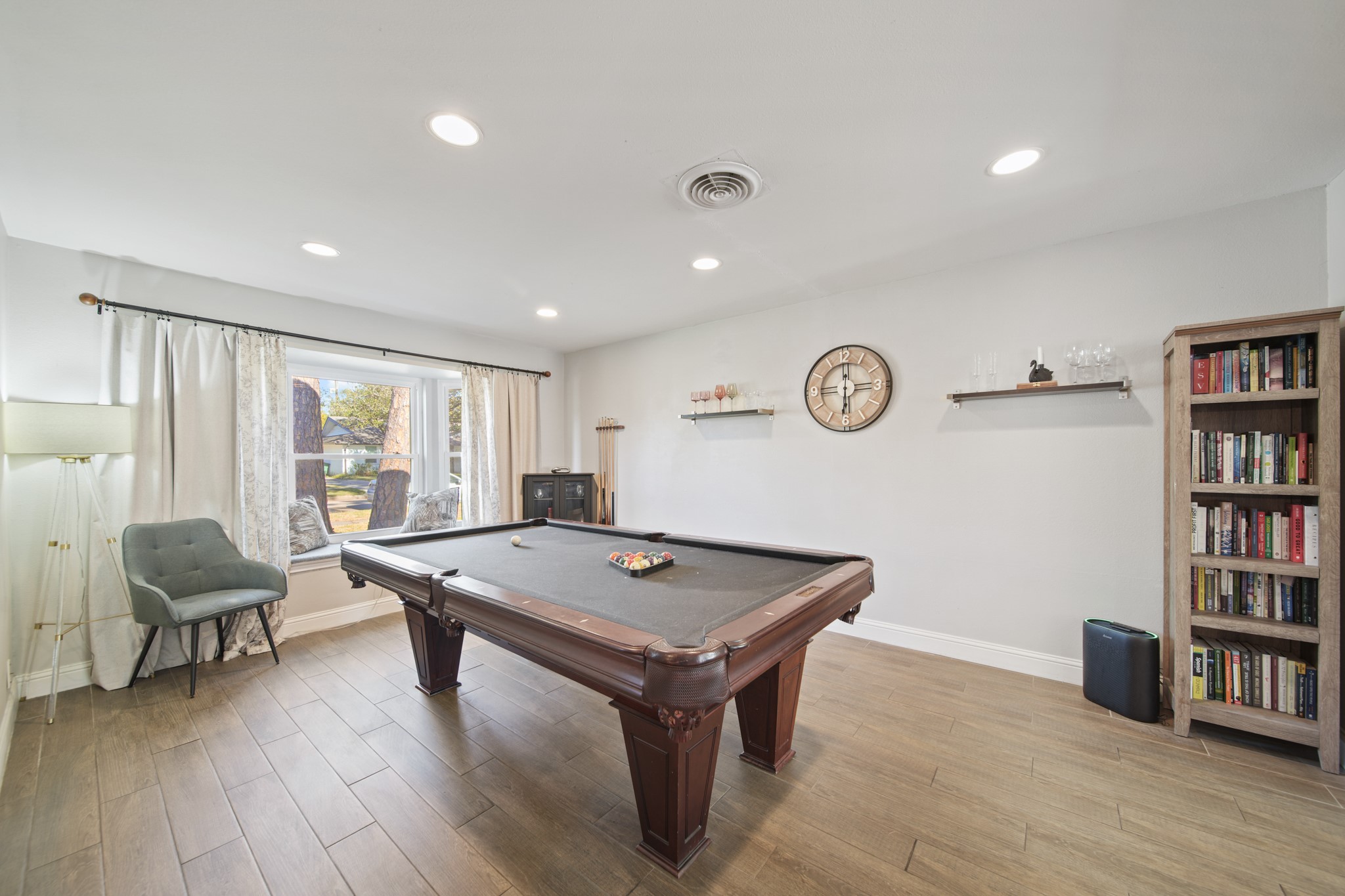 5919 Lattimer Drive Houston, TX 77035 - Photo 8 of 29 With ample space its well-proportioned design also allows for alternative uses such as a game room, library, or hobby space, offering both practicality and versatility.