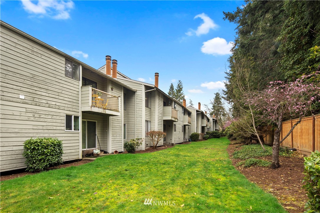14401 Southeast Petrovitsky Road, Unit B204 Renton, WA 98058 - Photo 24 of 31 a view of a house with backyard