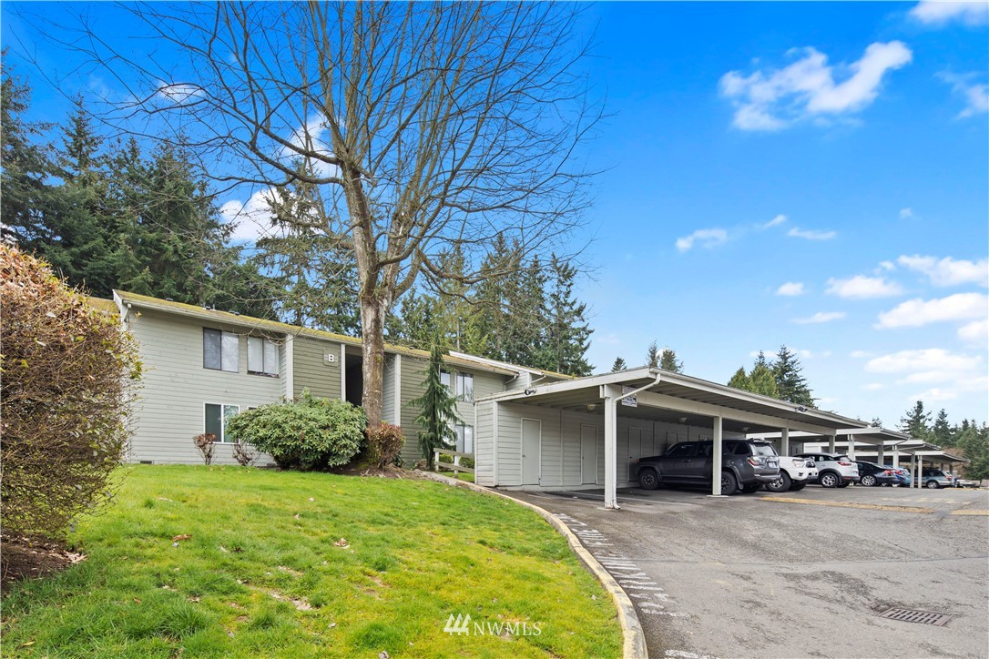 14401 Southeast Petrovitsky Road, Unit B204 Renton, WA 98058 - Photo 28 of 31 a view of a house with a yard