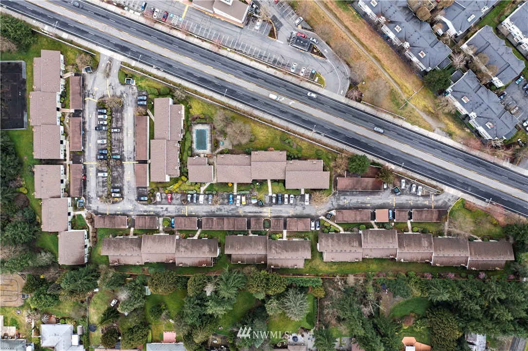 14401 Southeast Petrovitsky Road, Unit B204 Renton, WA 98058 - Photo 29 of 31 a view of a chairs with a table in balcony