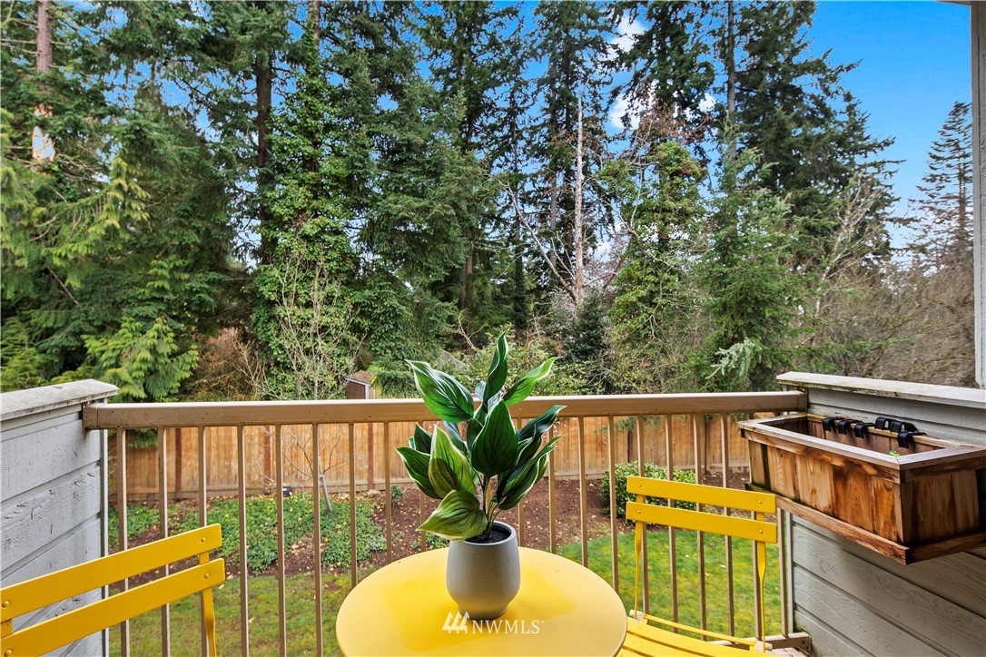 14401 Southeast Petrovitsky Road, Unit B204 Renton, WA 98058 - Photo 5 of 31 a view of a chairs and table in the balcony