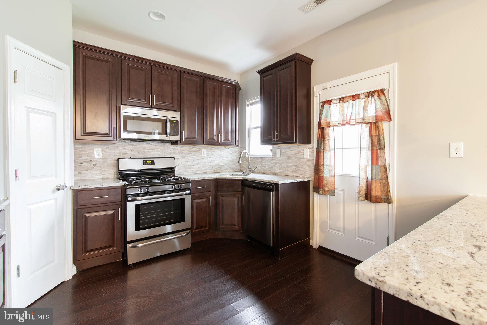 3409 Grantley Road Baltimore, MD 21215 - Photo 15 of 41 Kitchen with Pantry Door