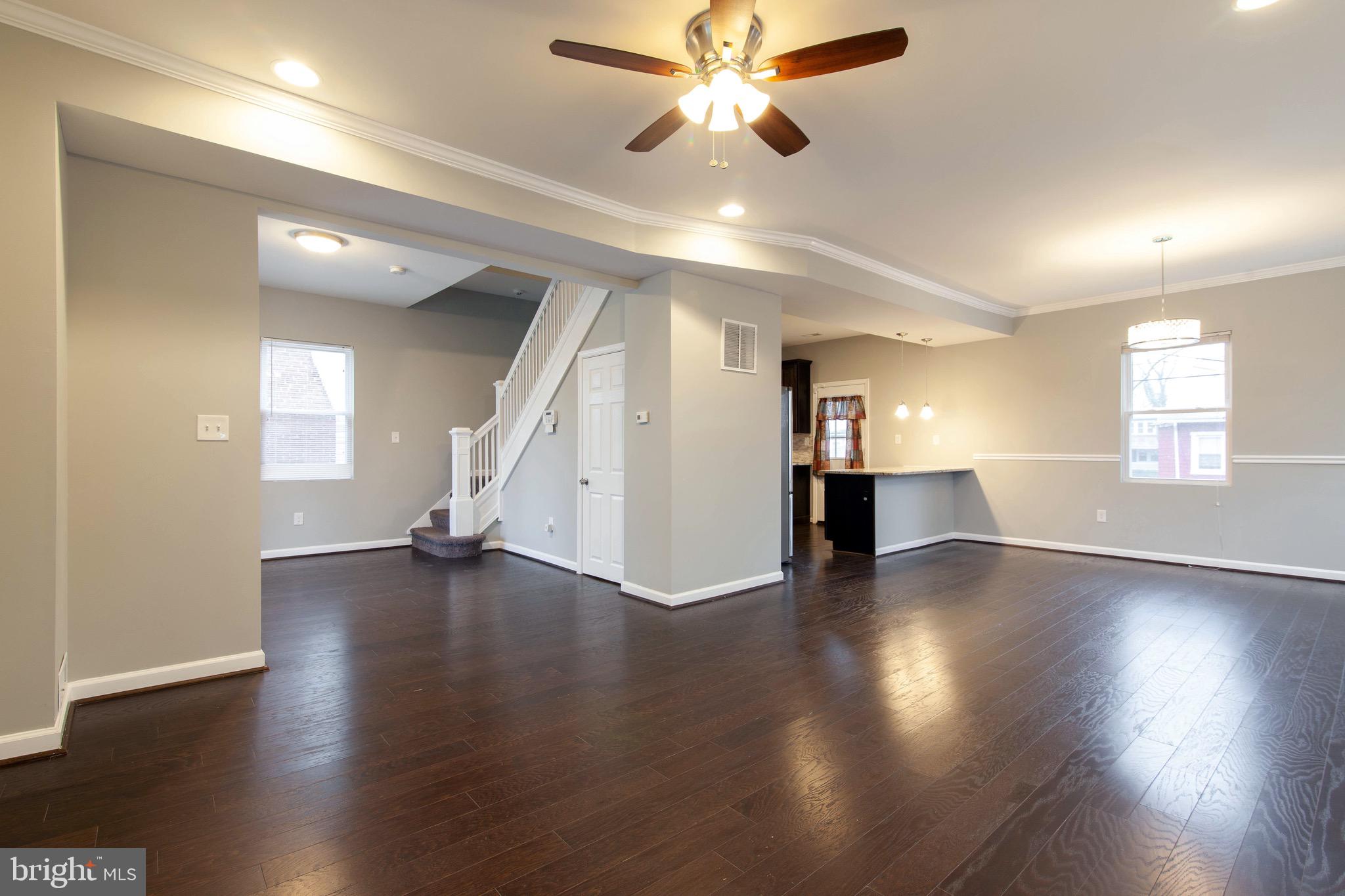 3409 Grantley Road Baltimore, MD 21215 - Photo 9 of 41 Living Room View to the Foyer, Dining Room and Kit