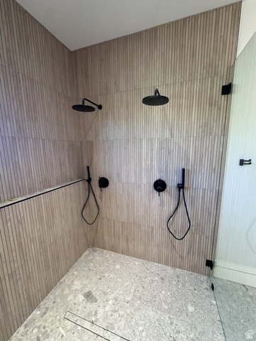 1918 Chimney Rock Road Heber City, UT 84032 - Photo 58 of 74 Spacious walk-in shower featuring textured vertical wall tiling and light-toned terrazzo-style floor tile