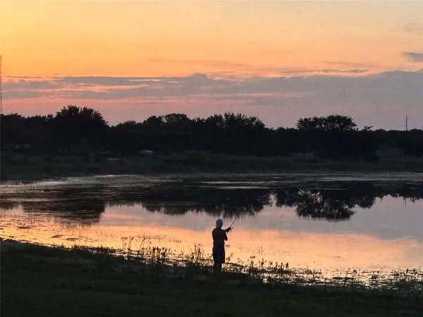 a view of a lake with a mountain in the background