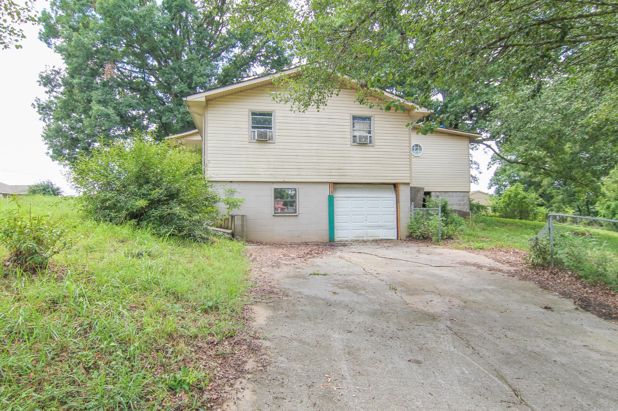 1006 Carding Machine Road Loudon, TN 37774 - Photo 4 of 15 a view of a house with yard and a garage