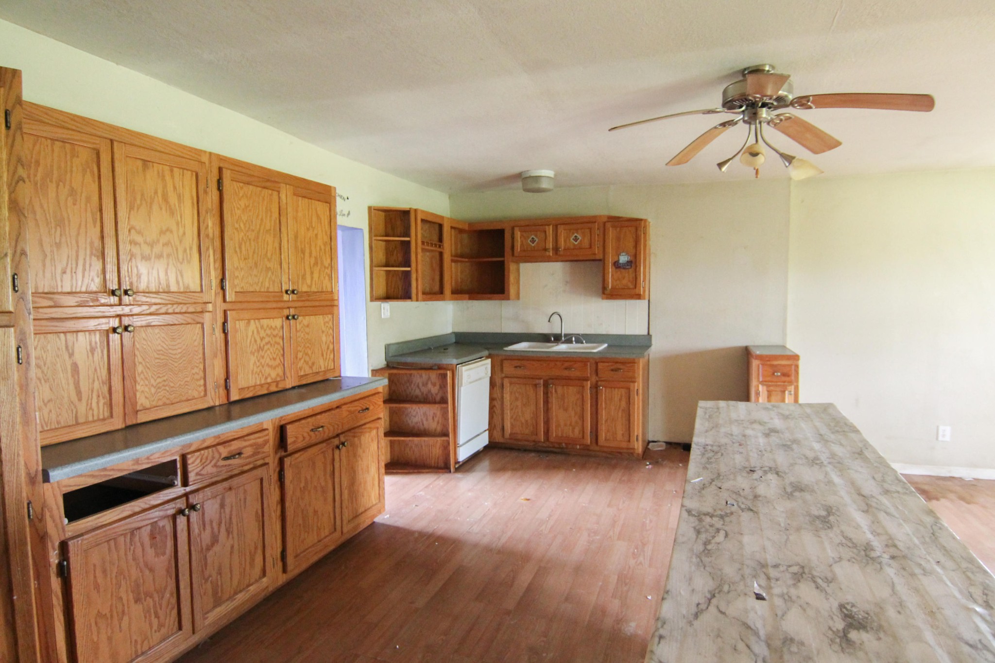 1006 Carding Machine Road Loudon, TN 37774 - Photo 8 of 15 a kitchen with stainless steel appliances a sink cabinets and wooden floor