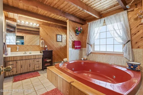 a bathroom with a sink and bathtub