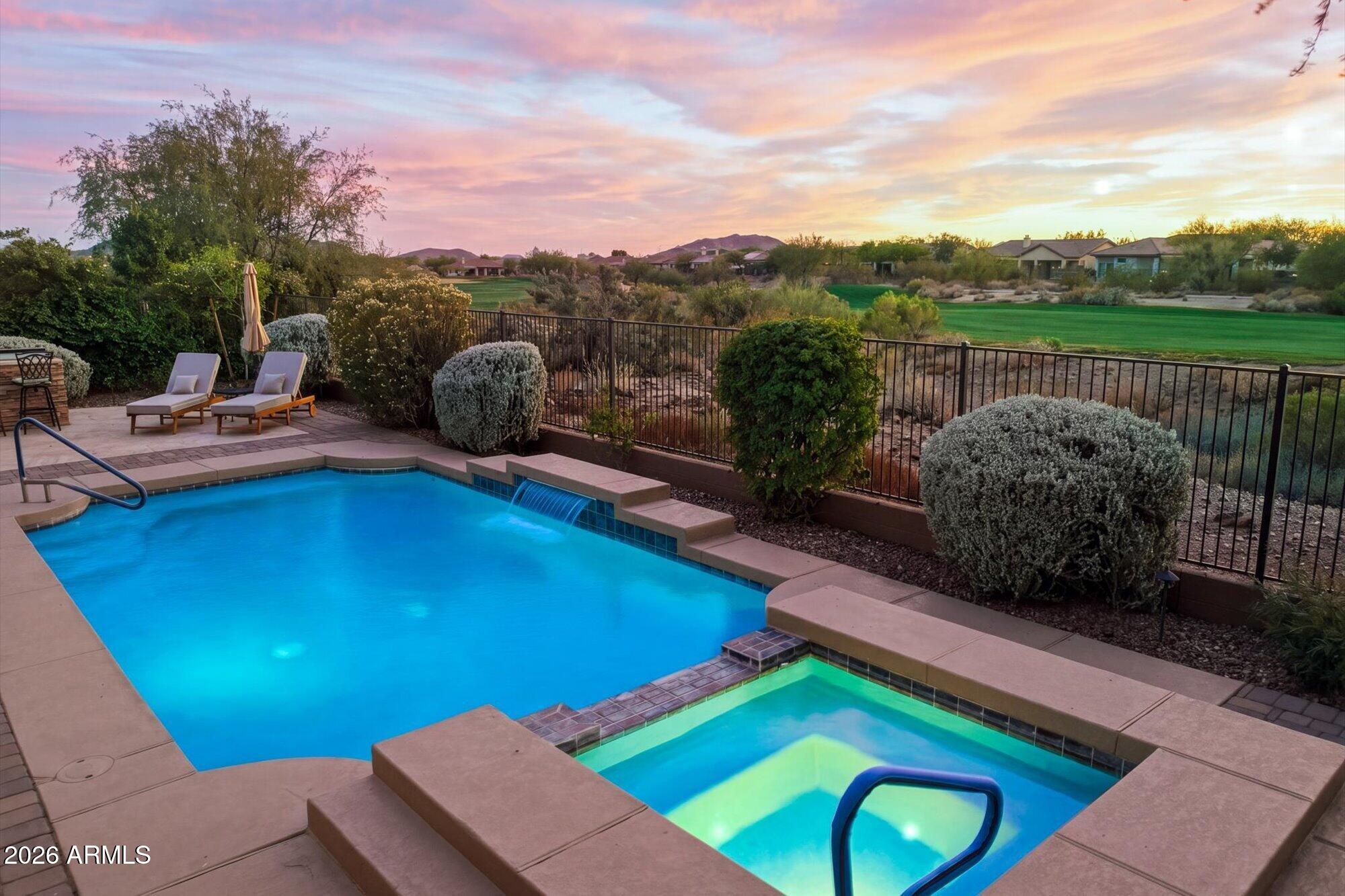40322 North Hawk Ridge Trail Anthem, AZ 85086 - Photo 29 of 63 a view of a pool with a patio