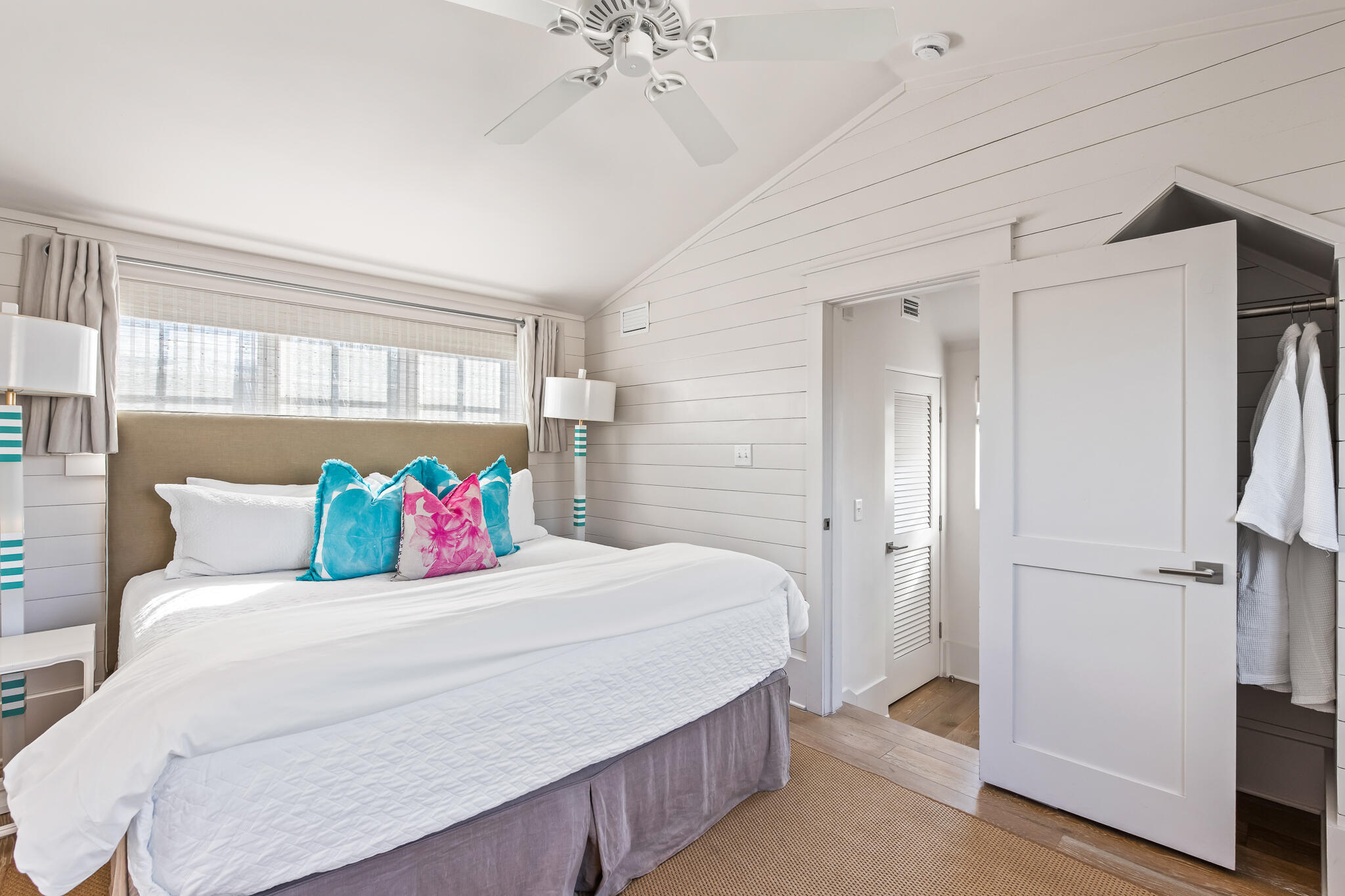 188 Round Road Inlet Beach, FL 32461 - Photo 82 of 98 a bedroom with a large bed and a chandelier