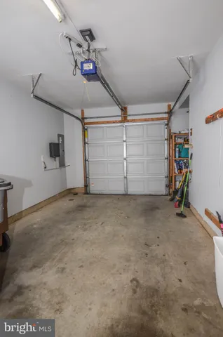 a view of a pathway along with wooden fence