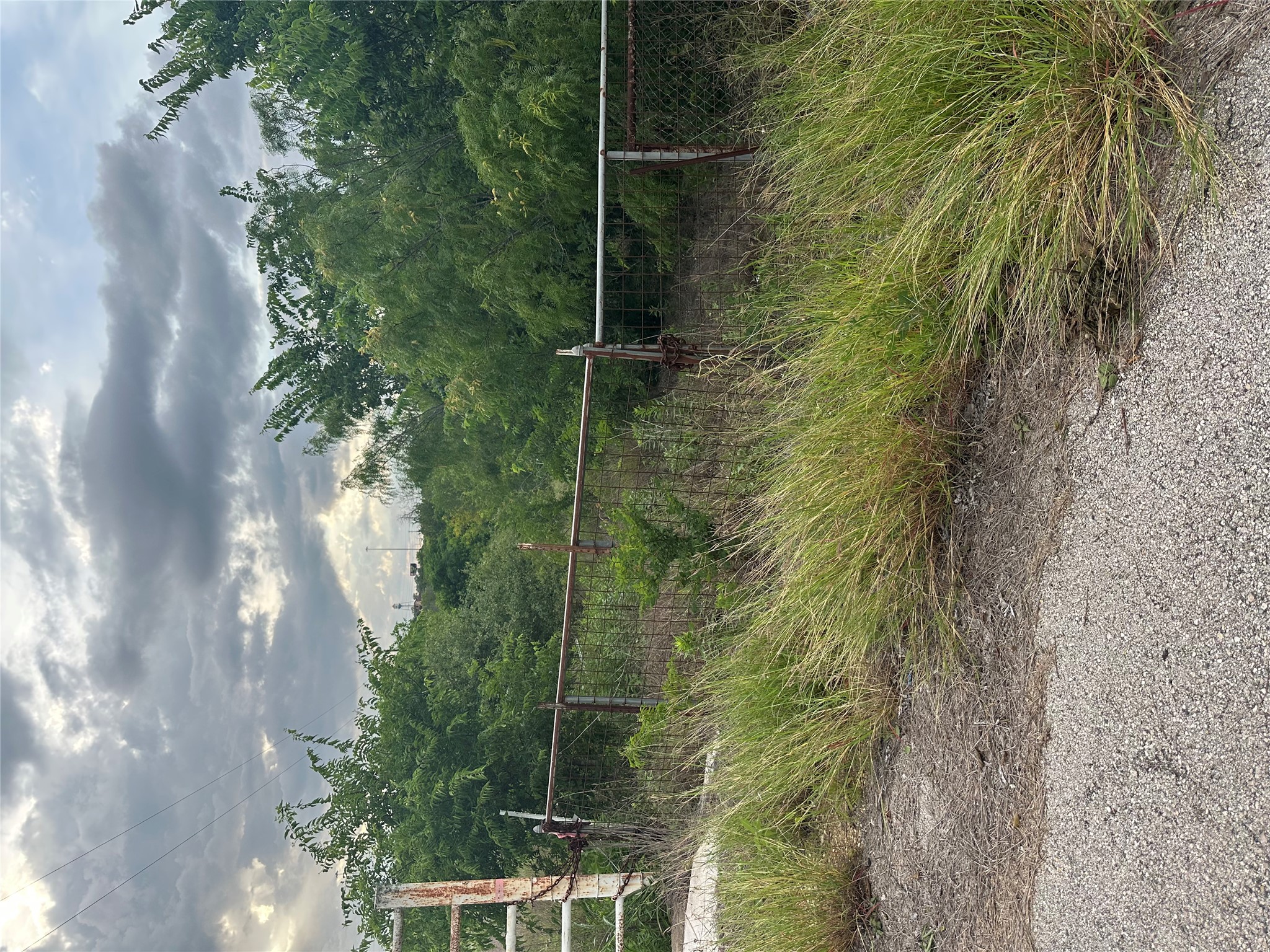 3 Lehman Road Kyle, TX 78640 - Photo 2 of 7 A promising lot awaits, offering ample space for future development.