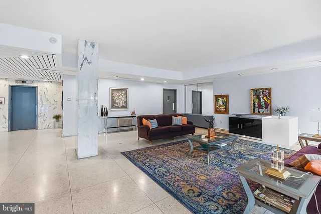 a view of a livingroom with furniture and garage