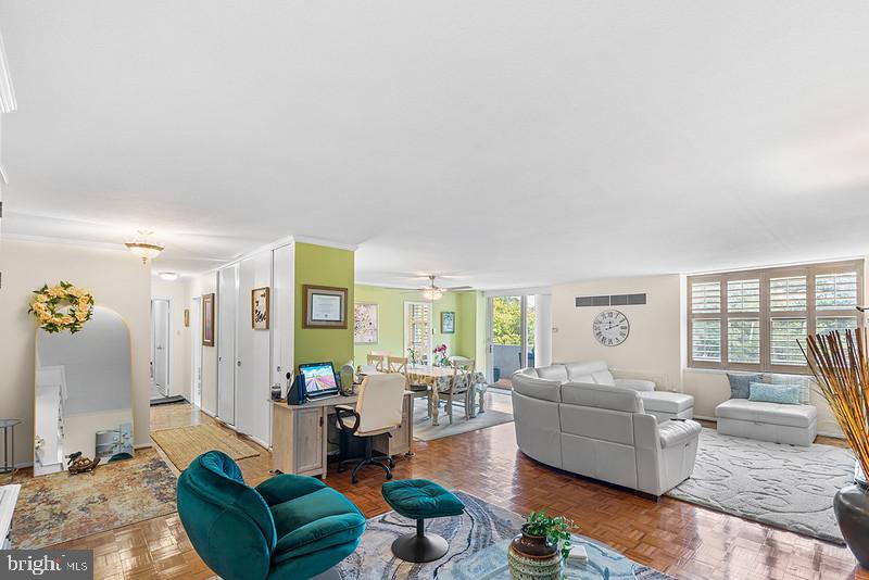 7301 Coventry Avenue, Unit 502 Elkins Park, PA 19027 - Photo 2 of 16 a living room with furniture and a large window
