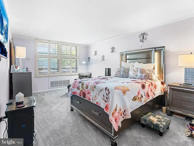 a bed room with a bed and a couch